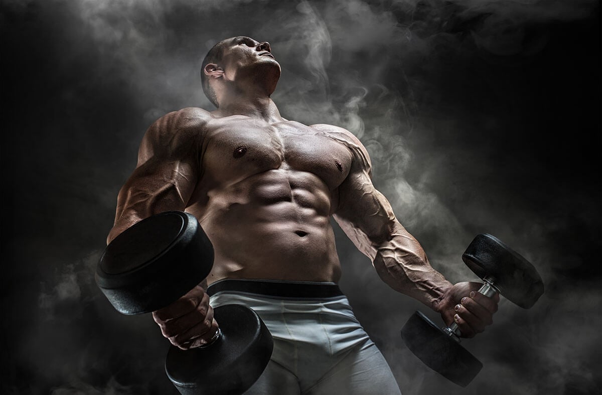 Men pumping up muscles